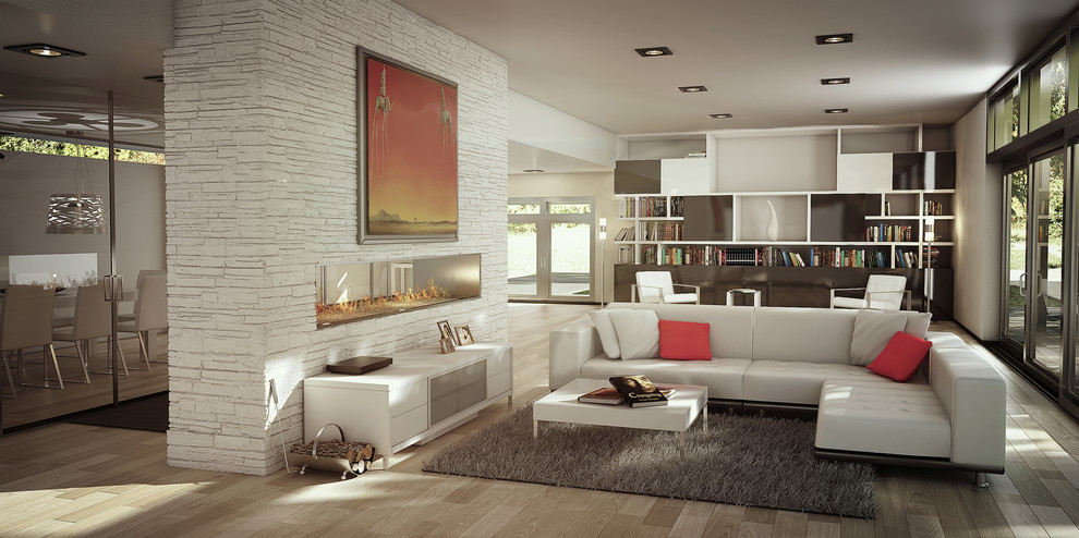 This is an example of a large contemporary living room in Miami with light hardwood flooring, a two-sided fireplace and a stone fireplace surround.