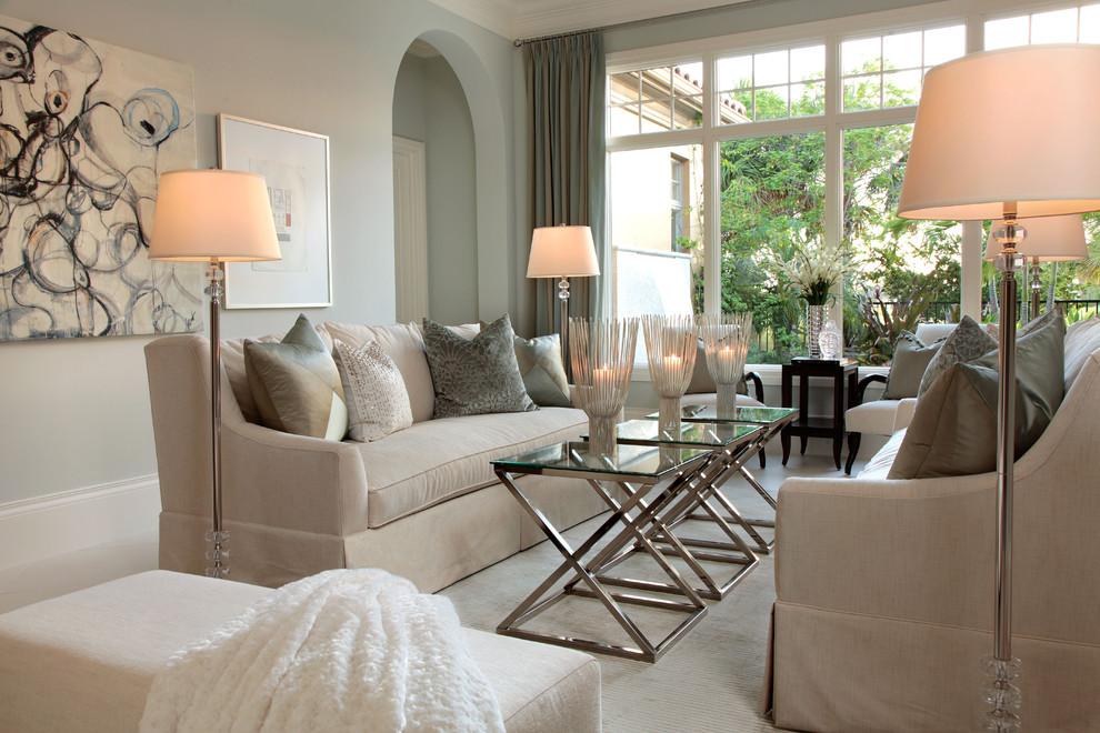 Medium sized classic grey and cream living room curtain in Miami with blue walls and carpet.