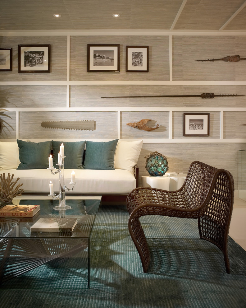 Living room - tropical living room idea in Miami with gray walls