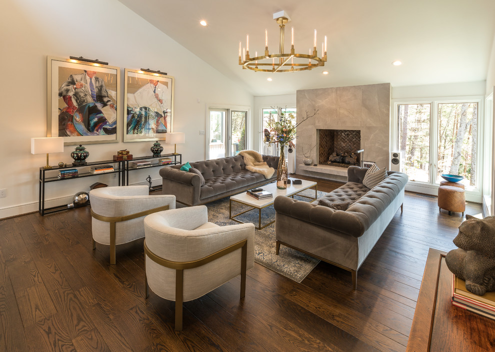 Large classic formal open plan living room in Other with white walls, dark hardwood flooring, a standard fireplace, no tv, brown floors, a stone fireplace surround and feature lighting.