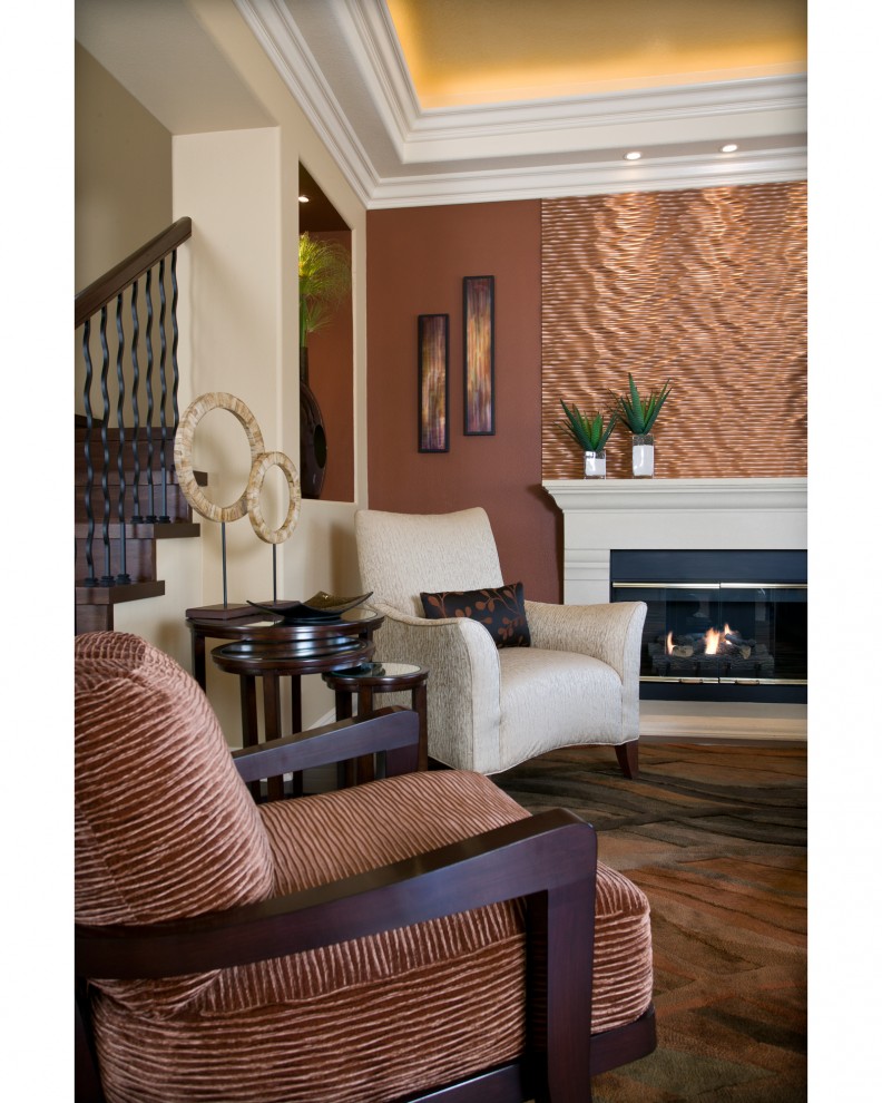 This is an example of a contemporary living room feature wall in Orange County with a standard fireplace and no tv.