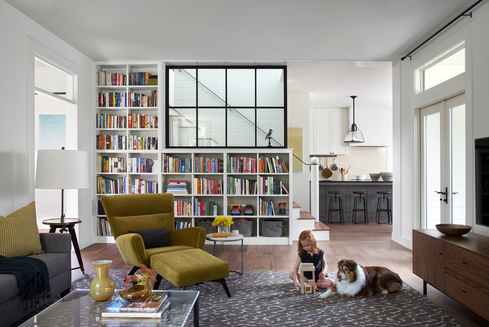 Mid-sized cottage living room library photo in Austin