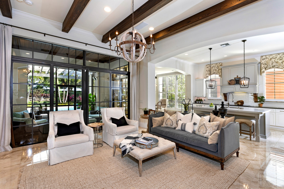 Open plan living room in Miami with grey walls and beige floors.
