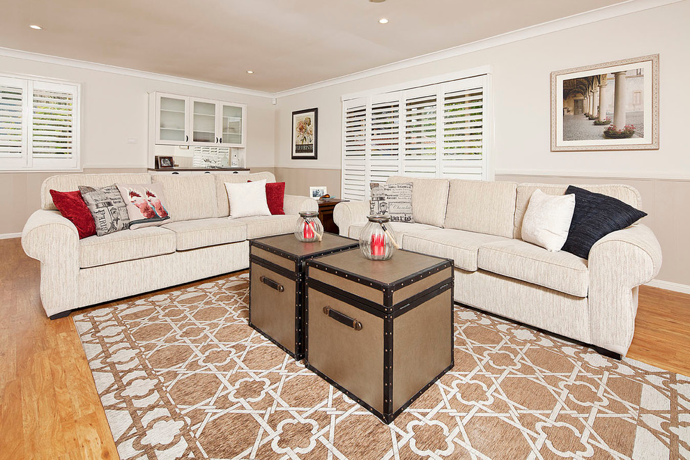 Example of a large farmhouse open concept living room design in Gold Coast - Tweed with beige walls