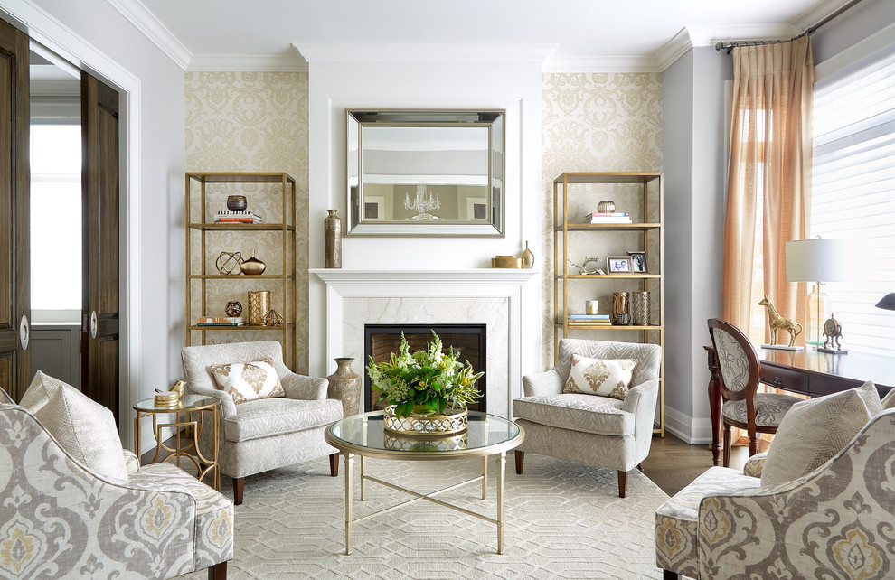 Living room - mid-sized transitional formal and enclosed medium tone wood floor and brown floor living room idea in Toronto with gray walls, a standard fireplace, a stone fireplace and no tv