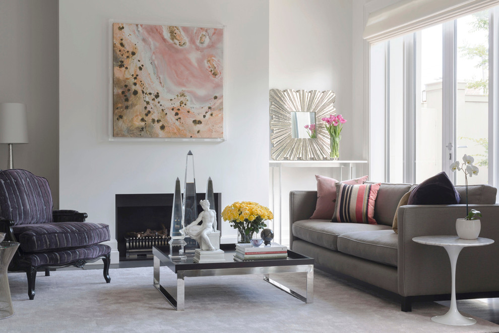 Example of a huge trendy open concept carpeted and pink floor living room design in Melbourne with white walls, a standard fireplace, a plaster fireplace and a concealed tv