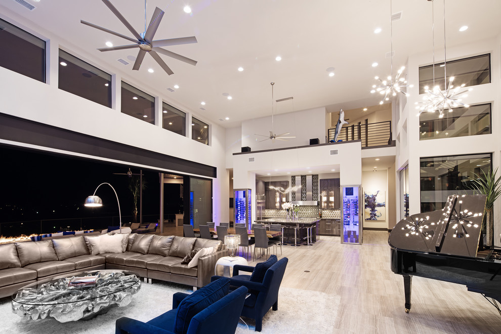 На фото: большая открытая гостиная комната в стиле модернизм с белыми стенами, полом из керамогранита, горизонтальным камином и фасадом камина из дерева без телевизора