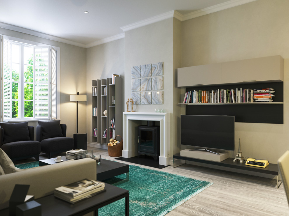Design ideas for a medium sized contemporary open plan living room in London with light hardwood flooring, a wood burning stove, a stone fireplace surround and a freestanding tv.