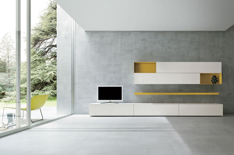 Exempel på ett stort modernt allrum med öppen planlösning, med ett finrum, grå väggar, betonggolv och en fristående TV