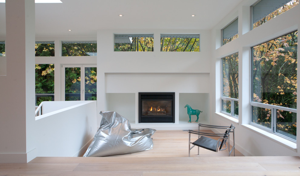 Modern living room in Vancouver with white walls.