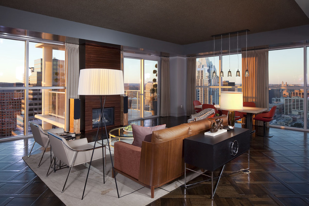 Свежая идея для дизайна: гостиная комната в стиле модернизм с синими стенами, стандартным камином и ковром на полу - отличное фото интерьера