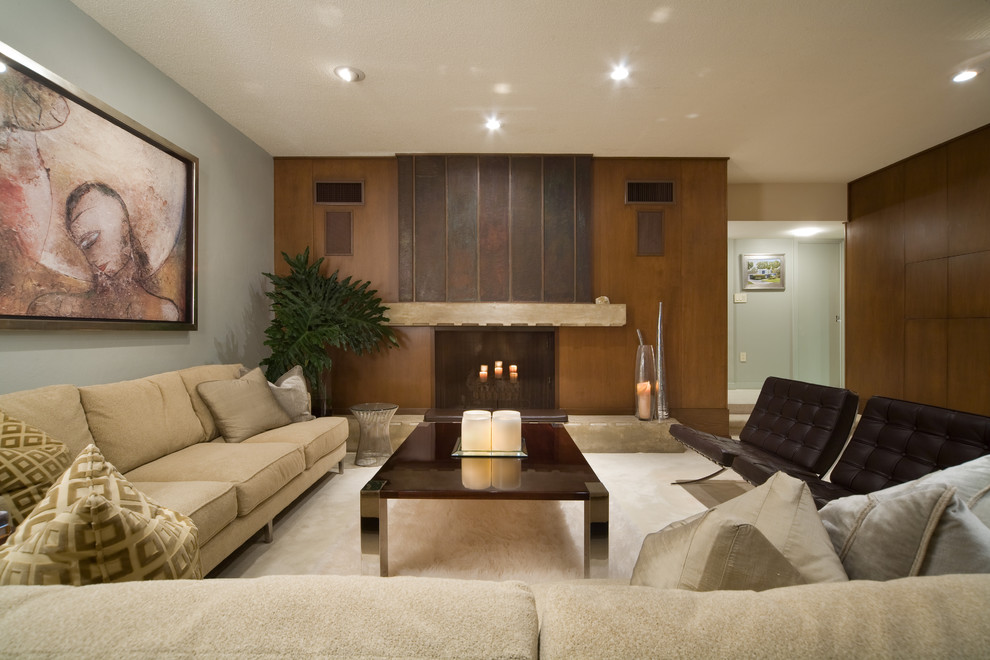 Living room - modern living room idea in Other with a wood fireplace surround and a standard fireplace