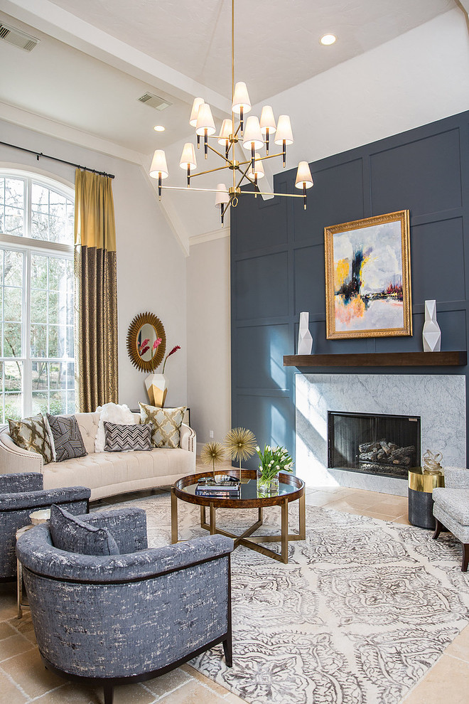 This is an example of a traditional formal living room in Houston with beige floors, grey walls, a standard fireplace, a stone fireplace surround and no tv.