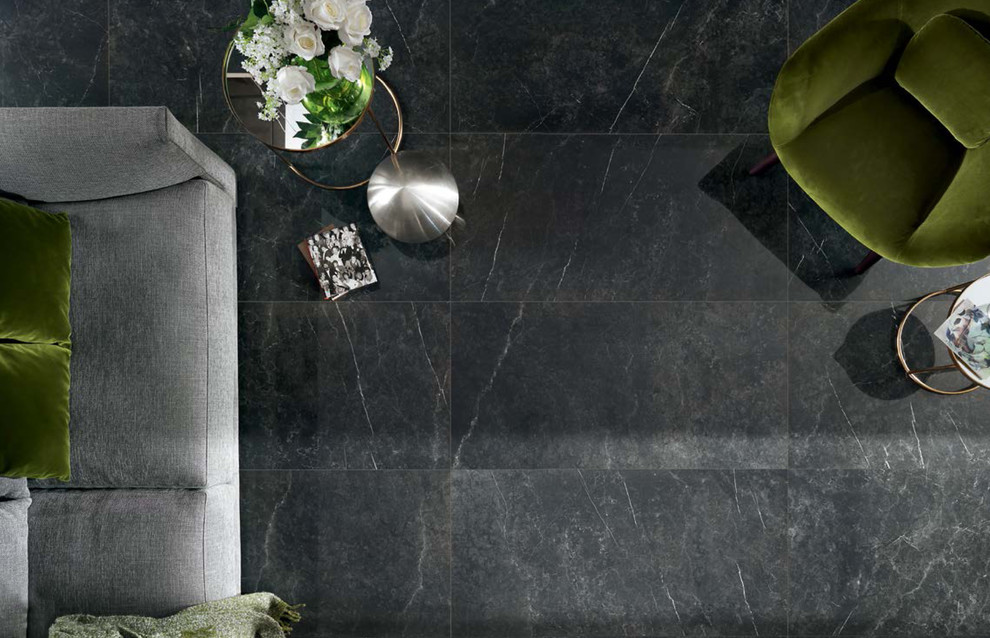 Modern living room with black marble look porcelain tile - Modern