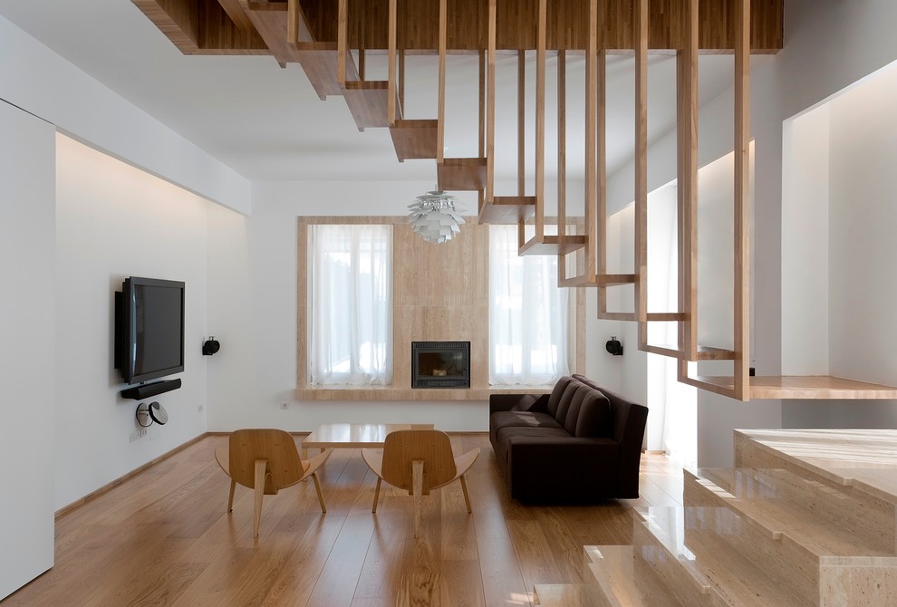 Photo of a modern living room in Montreal with white walls.