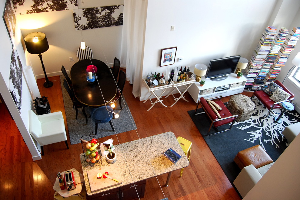 Living room library - eclectic living room library idea in DC Metro with a tv stand
