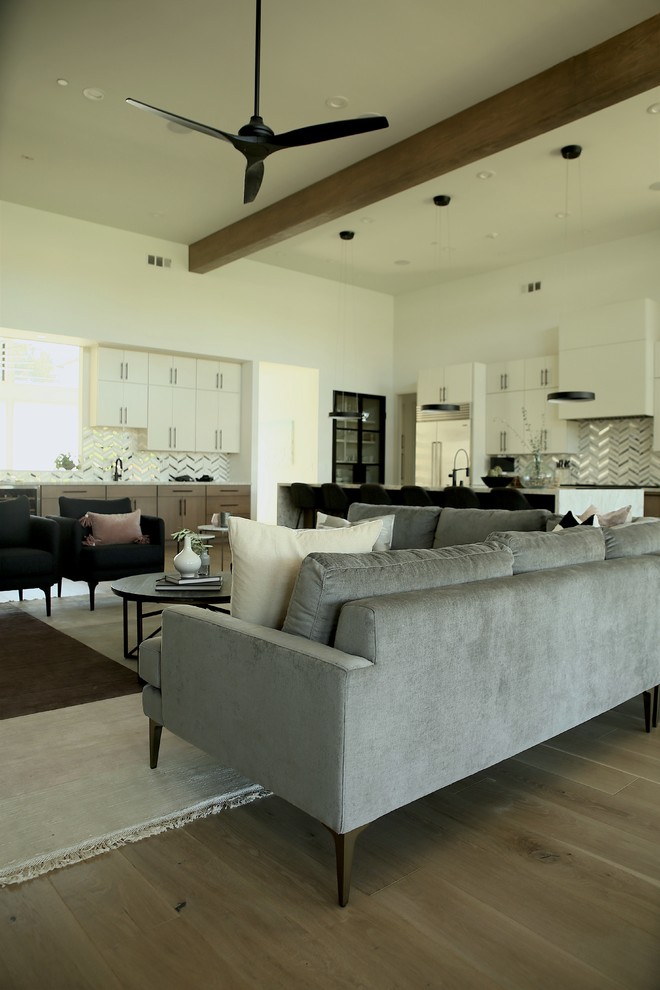 Example of a large minimalist formal and open concept medium tone wood floor and brown floor living room design in San Francisco with white walls, a tile fireplace, a wall-mounted tv and a ribbon fireplace