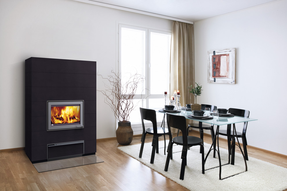 This is an example of a scandi living room in Gloucestershire with a wood burning stove.