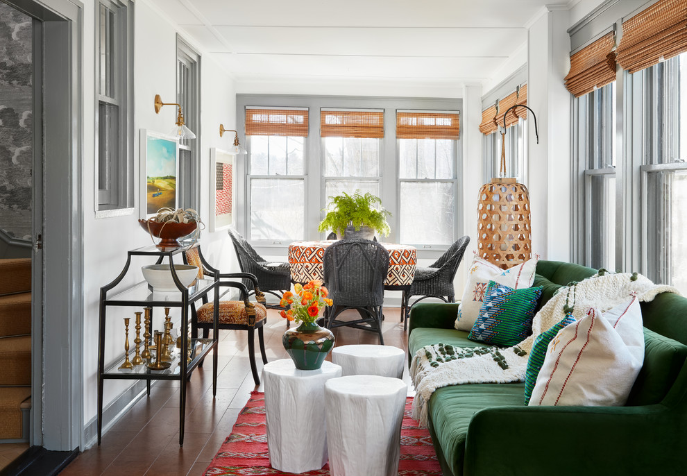 Inspiration for an eclectic open concept dark wood floor and brown floor living room remodel in Chicago