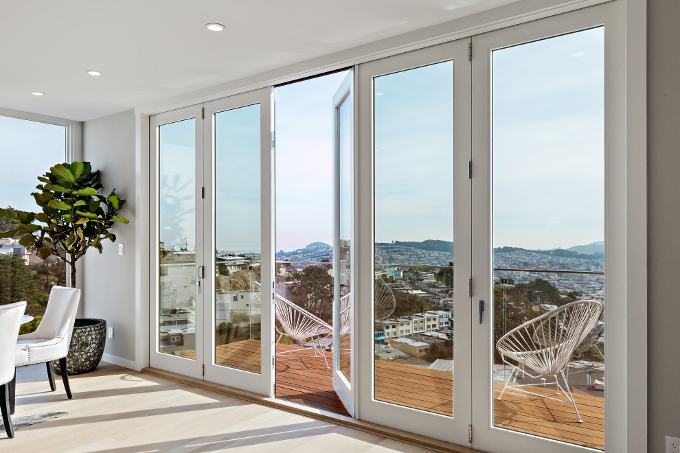 Modern San Francisco Dwelling Enjoys Indoor/Outdoor Living with Folding Doors Midcentury