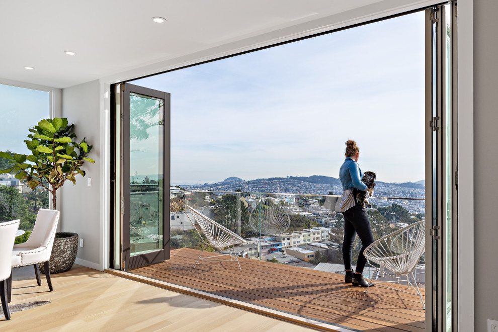 Modern San Francisco Dwelling Enjoys Indoor/Outdoor Living with Folding Doors Midcentury
