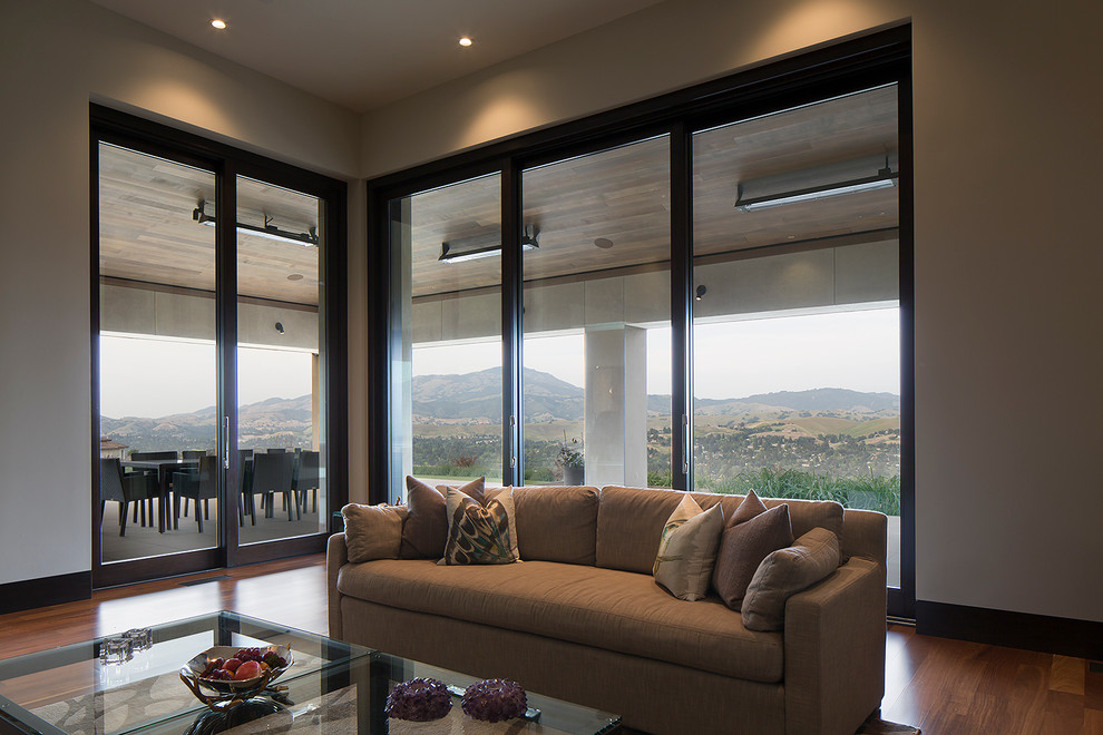 Inspiration for a modern open plan living room in San Francisco with medium hardwood flooring.