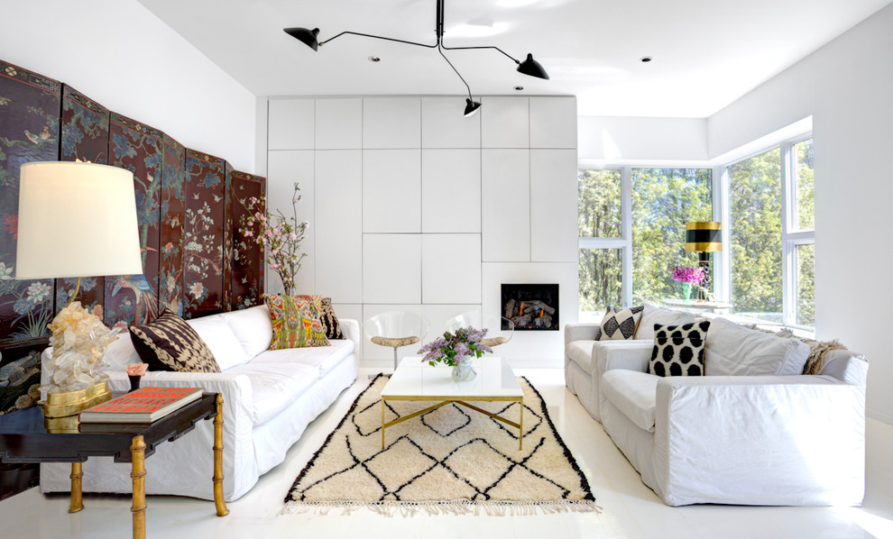 Esempio di un soggiorno contemporaneo di medie dimensioni con pareti bianche