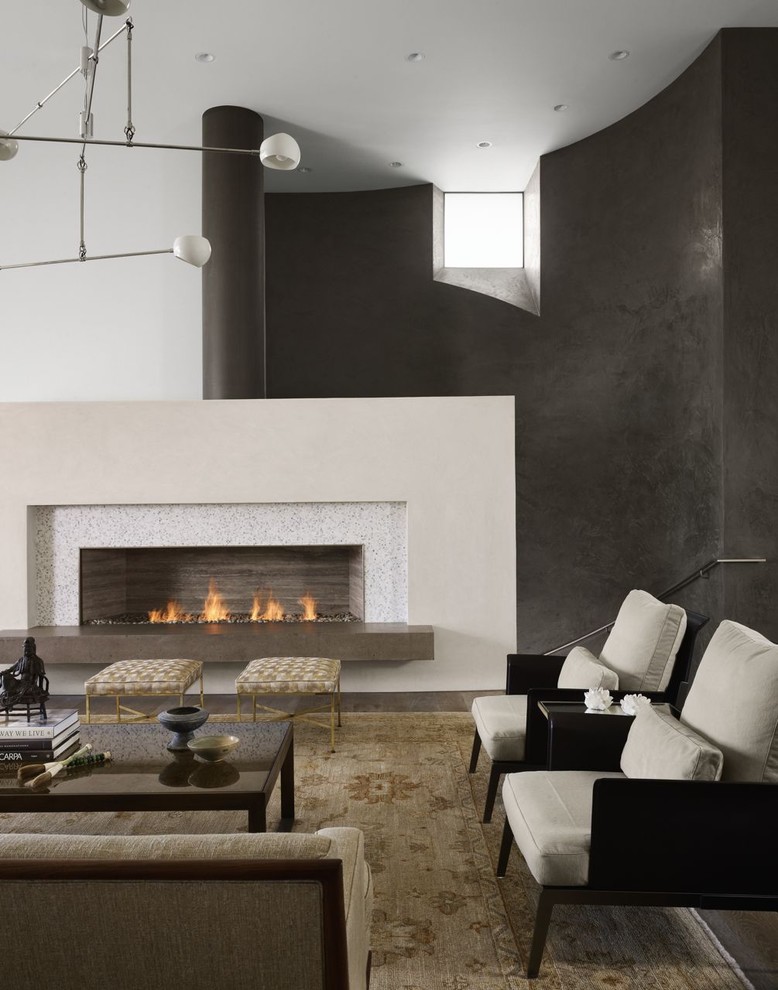 Contemporary living room feature wall in Austin with black walls, a ribbon fireplace and no tv.