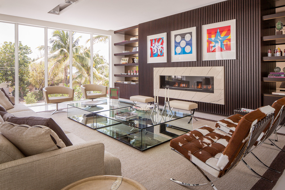 Example of a large trendy enclosed porcelain tile living room design in Miami with white walls, a ribbon fireplace, a stone fireplace and no tv