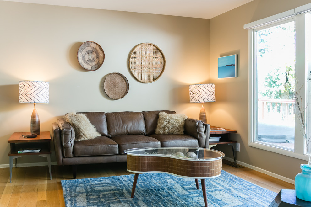 Immagine di un soggiorno minimalista di medie dimensioni con pareti beige