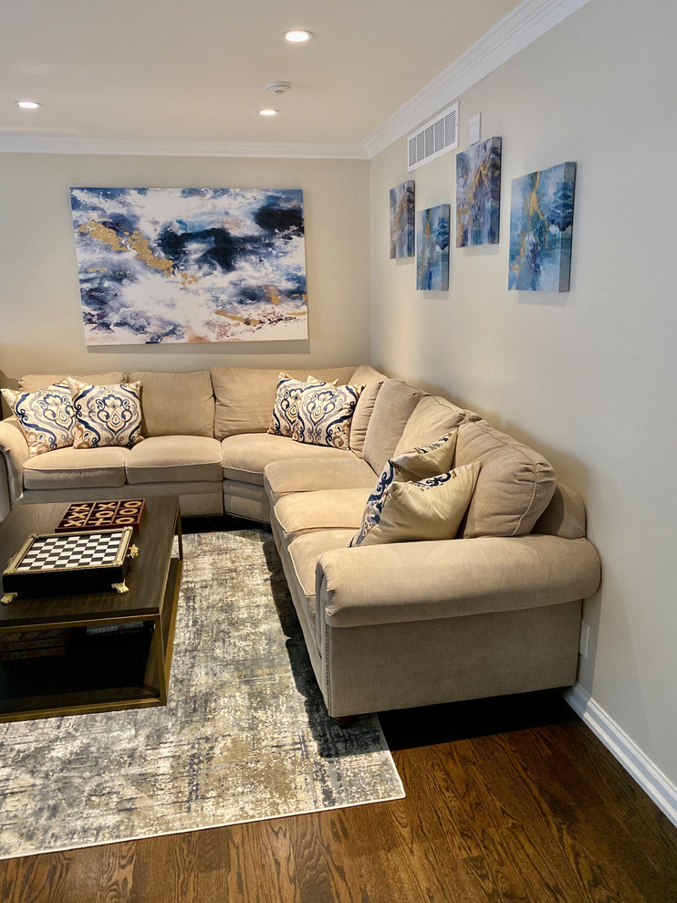 Medium sized classic open plan living room in Detroit with grey walls, dark hardwood flooring and brown floors.