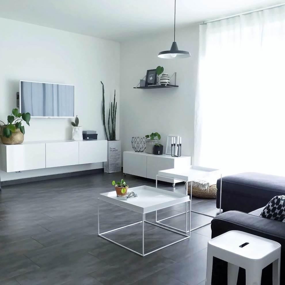 Mid-sized trendy open concept dark wood floor living room photo in Other with white walls