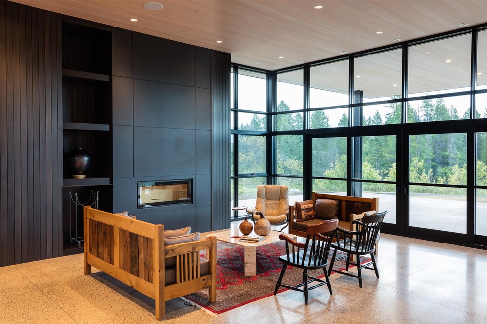 Свежая идея для дизайна: открытая гостиная комната в современном стиле с черными стенами и горизонтальным камином - отличное фото интерьера