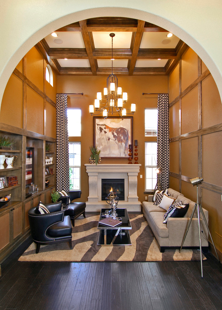 Photo of a mediterranean living room in Denver with brown walls.