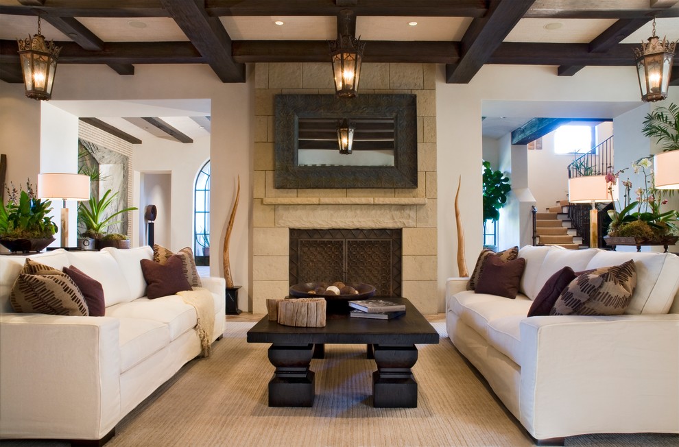 Example of a mid-sized trendy formal and open concept carpeted living room design in Santa Barbara with white walls, a standard fireplace, a stone fireplace and no tv