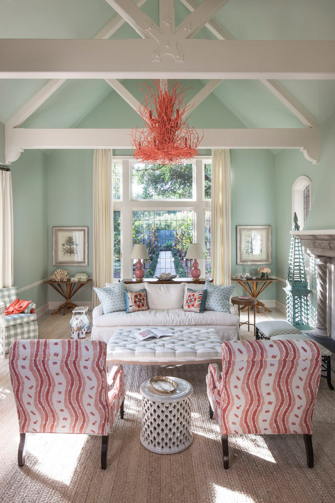 Inspiration for a beach style formal living room in Seattle with a standard fireplace and green walls.