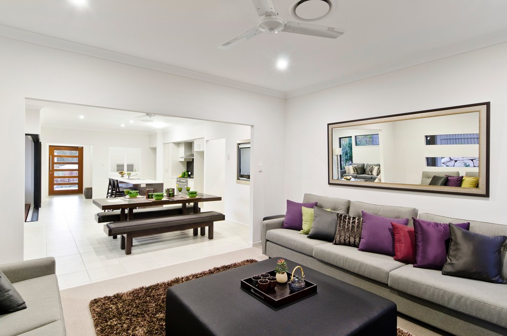 Стильный дизайн: открытая гостиная комната среднего размера в современном стиле с белыми стенами и ковровым покрытием без камина, телевизора - последний тренд