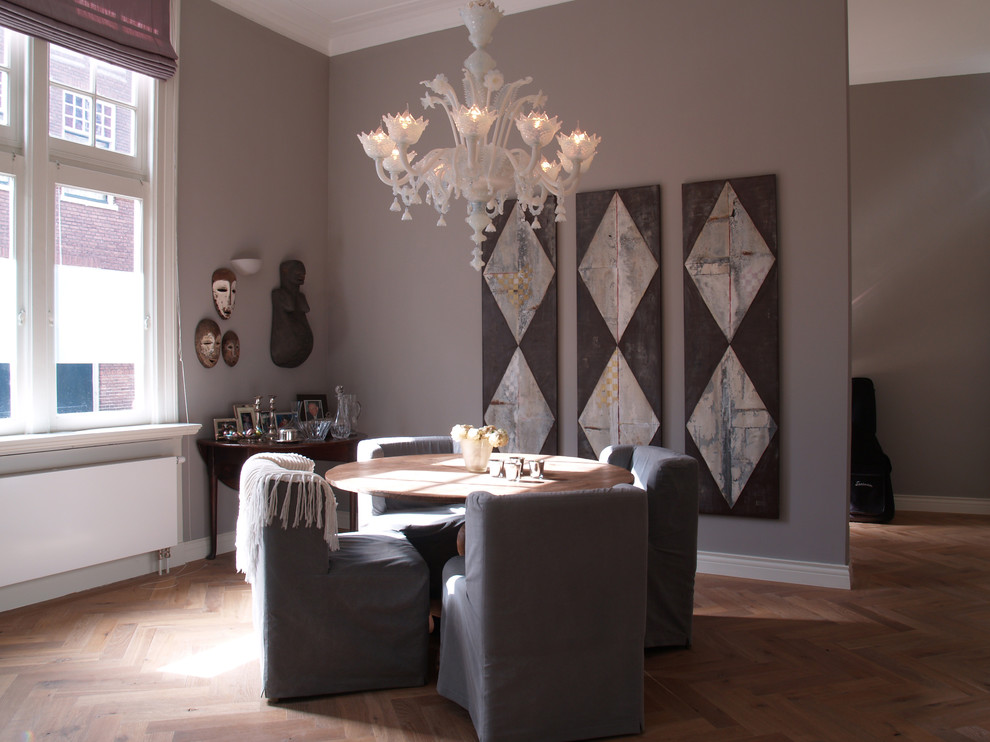 Example of a trendy dining room design in Amsterdam