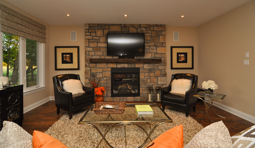 Example of a transitional living room design in Ottawa
