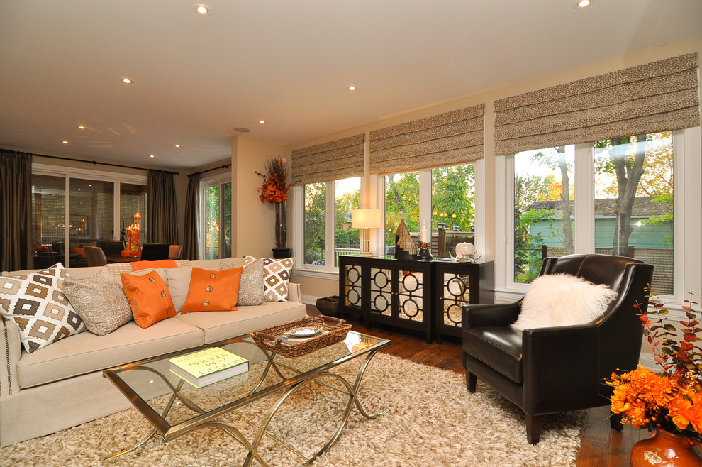 Elegant living room photo in Ottawa with beige walls
