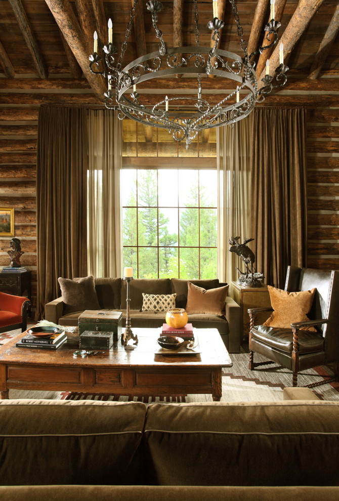 Foto di un soggiorno stile rurale con pareti marroni