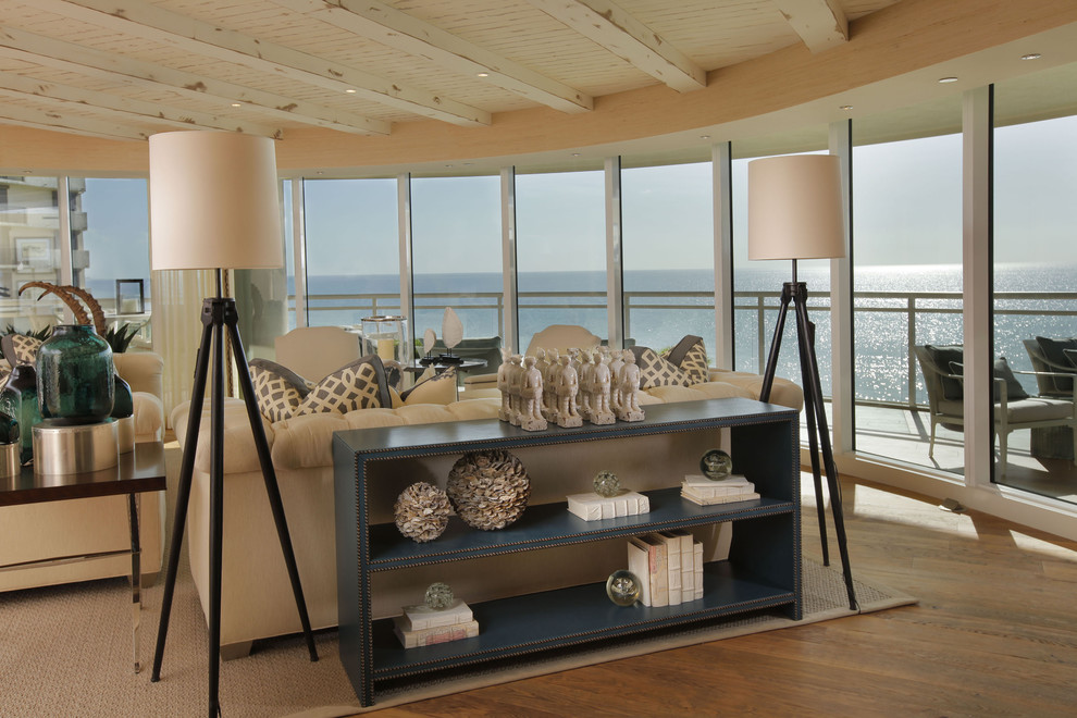 Beach style open concept living room photo in Miami
