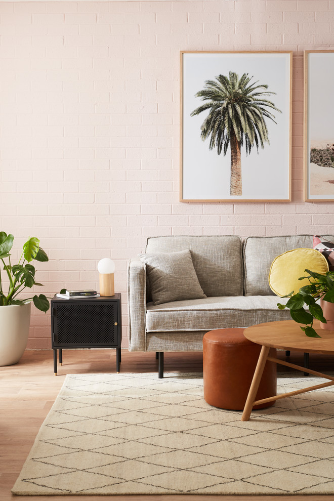 Design ideas for a medium sized contemporary open plan living room in Sydney with pink walls, vinyl flooring and brown floors.