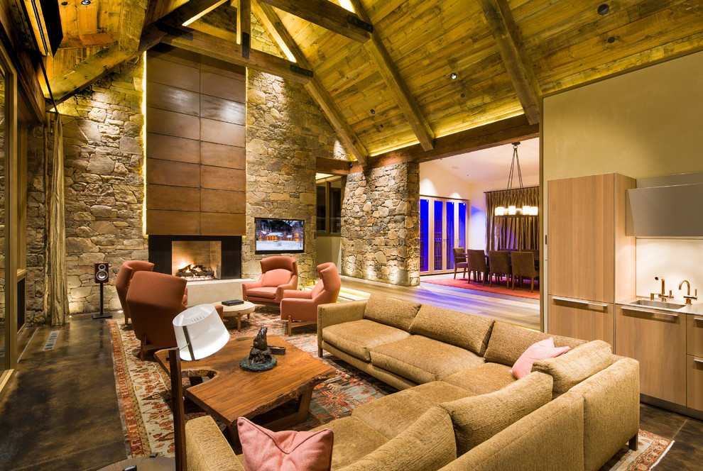 Пример оригинального дизайна: гостиная комната в стиле рустика с бетонным полом