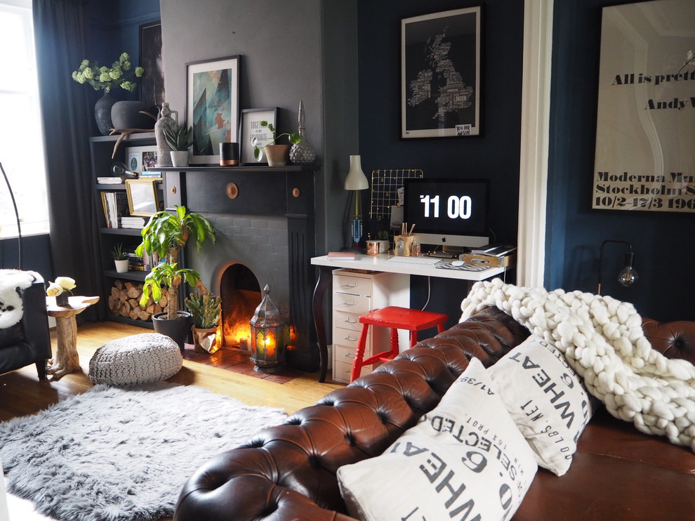 Inspiration for an eclectic living room in Other with blue walls.