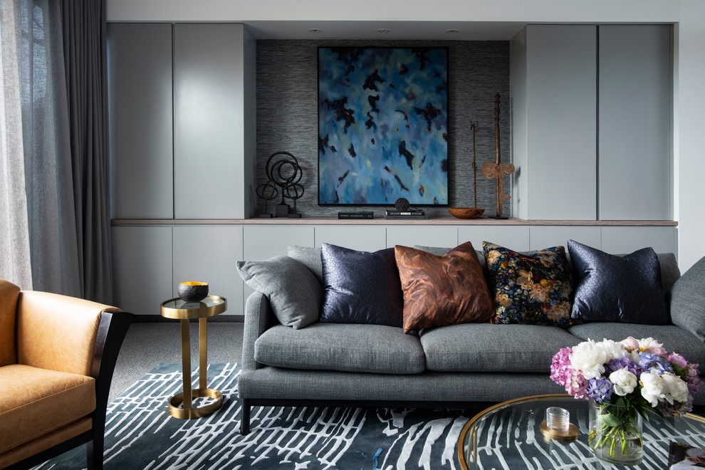 Immagine di un grande soggiorno design con moquette e pavimento grigio