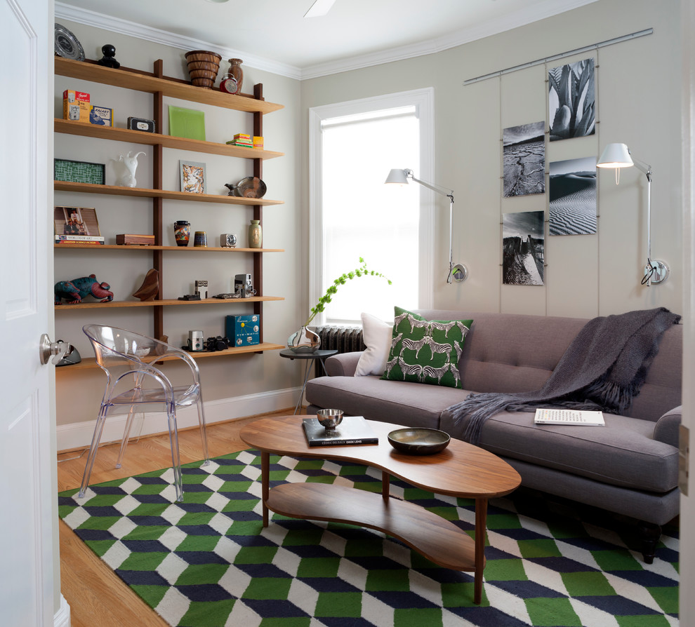 Inspiration for a small 1950s enclosed light wood floor and beige floor living room remodel in DC Metro with beige walls, no fireplace and no tv