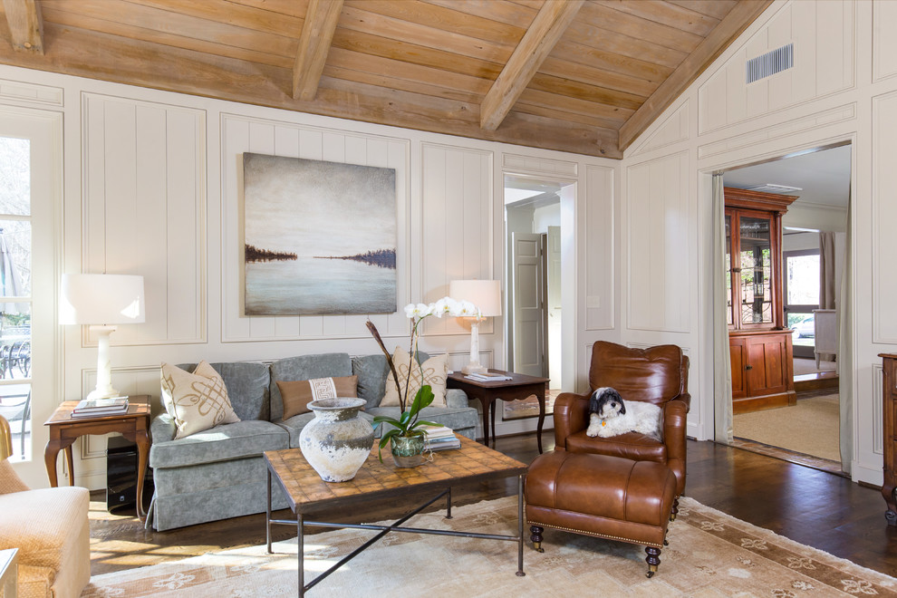 Living room - large french country formal and open concept dark wood floor and brown floor living room idea in Birmingham with white walls, a standard fireplace, a tile fireplace and no tv