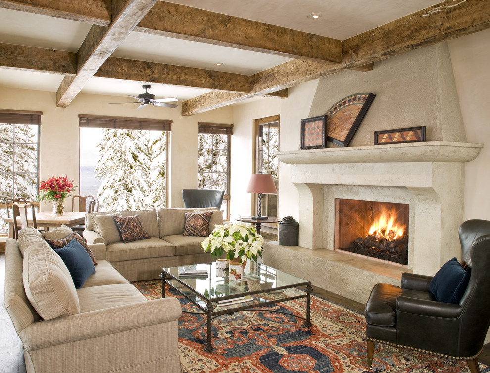 Living room - traditional living room idea in Other with a standard fireplace