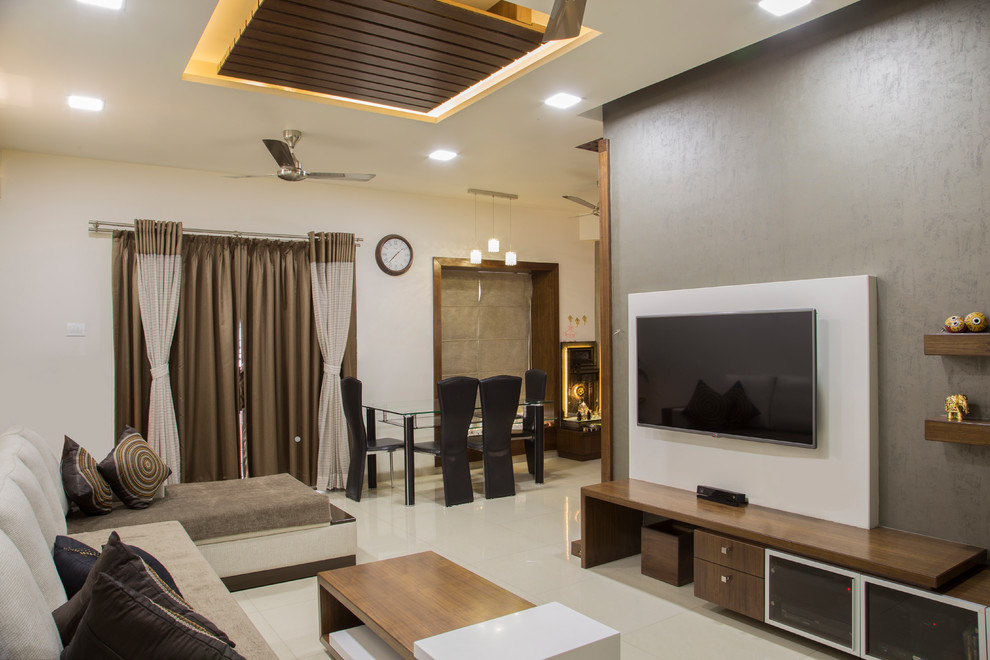 Trendy living room photo in Pune
